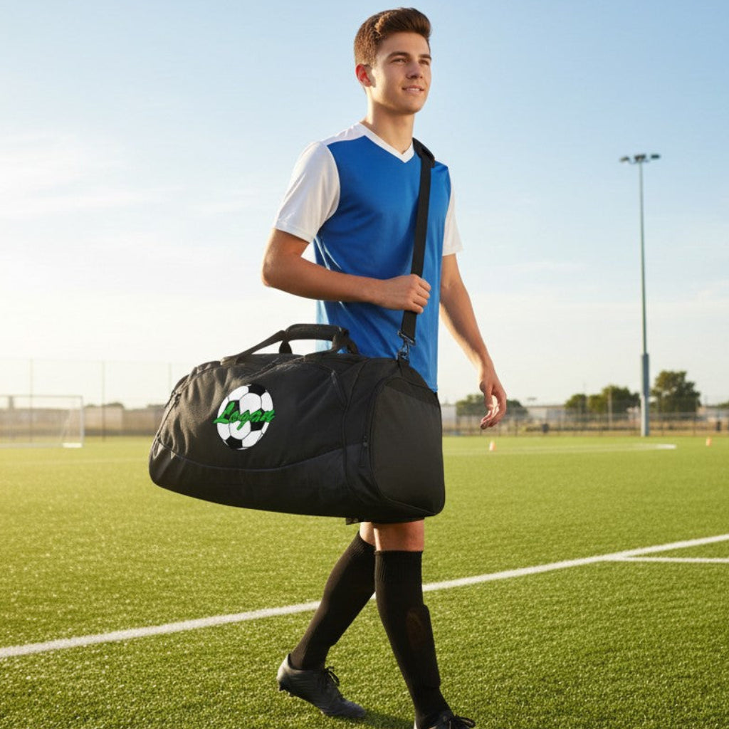 black duffel bag with a green and white Soccer logo.